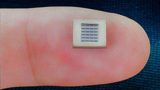An xMEMS Labs micro solid-state speaker on top of a finger