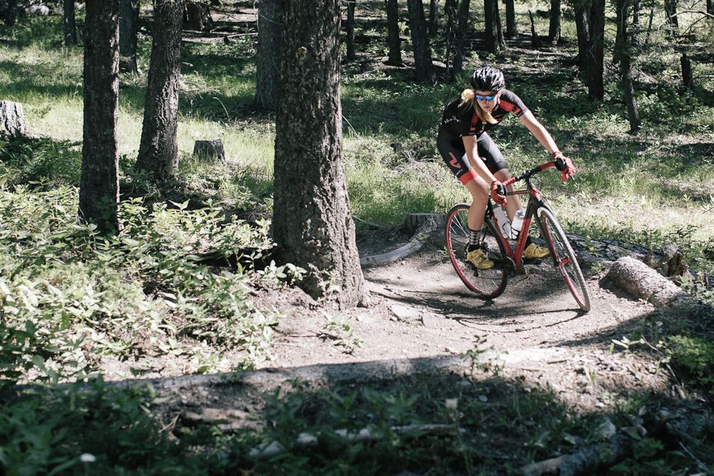 A camper negotiates the trees and Montana Cross Camp
