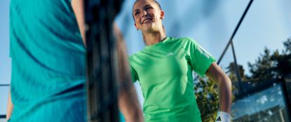 woman chatting playing tennis