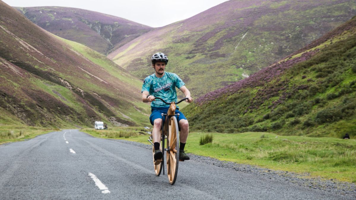 Endura athlete riding the totally wooden bike for the &#039;Forgotten Legend&#039; project