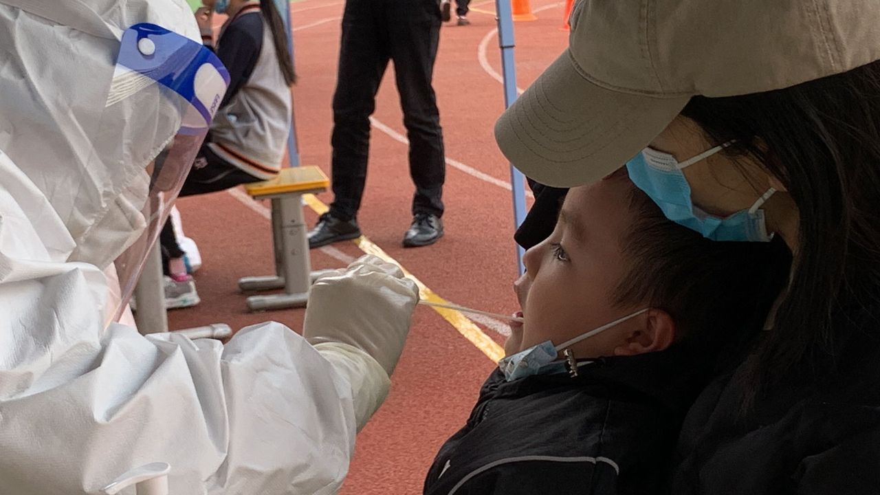 A child is tested for Covid-19 in Lanzhou, China