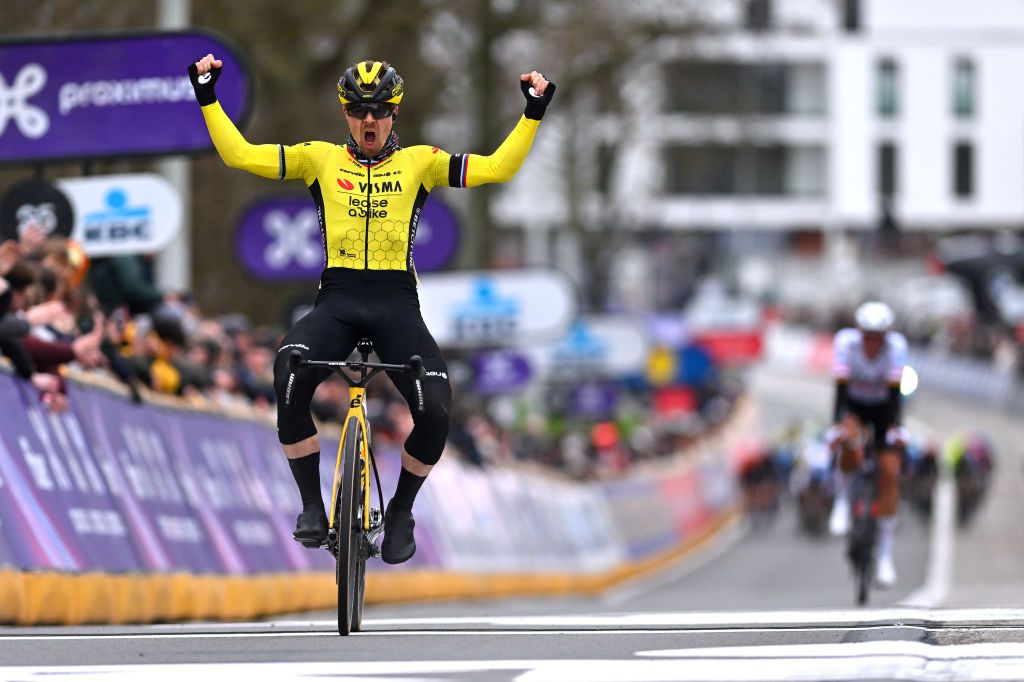 NINOVE BELGIUM FEBRUARY 24 Jan Tratnik of Slovenia and Team Visma Lease A Bike celebrates at finish line as race winner during the 79th Omloop Het Nieuwsblad 2024 Mens Elite a 2022km one day race from Ghent to Ninove UCIWT on February 24 2024 in Ninove Belgium Photo by Luc ClaessenGetty Images