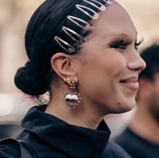 women with clips in her hair during paris fashion week