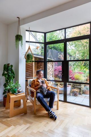 Crittall style doors in a dining area with parquet floors