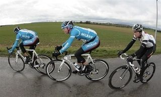 Niki Terpstra (Team Milram) rides in the middle of Peter Velits (Team Milram) and Bernhard Eisel (High Road) (r).