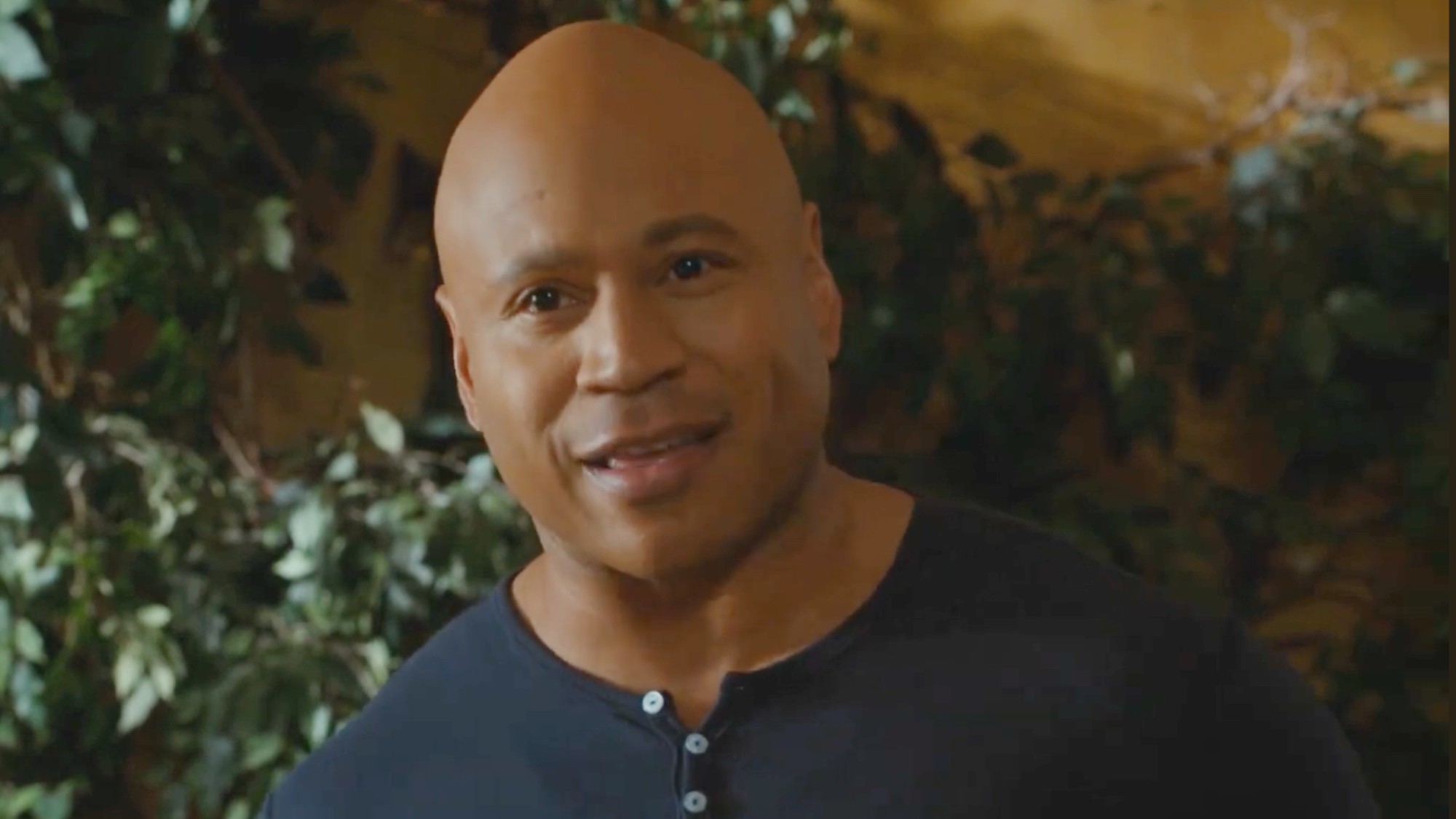 Sam smiling on NCIS: Los Angeles.