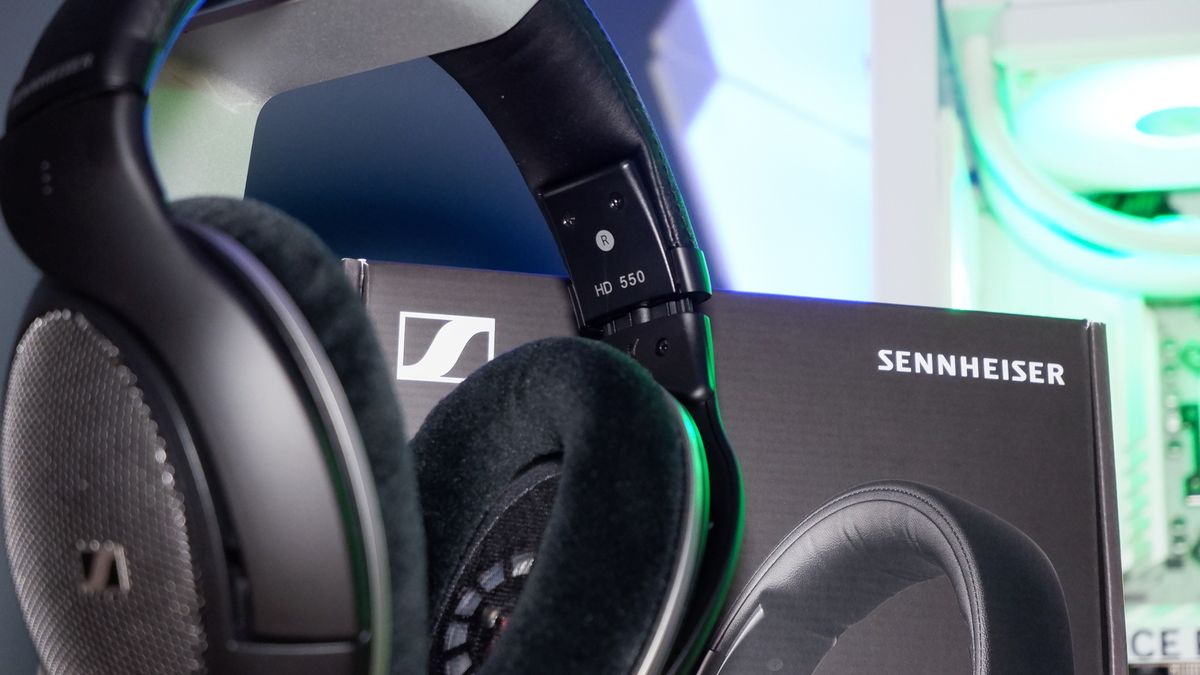 A pair of Sennheiser HD 550 headphones sat in front of its packaging.