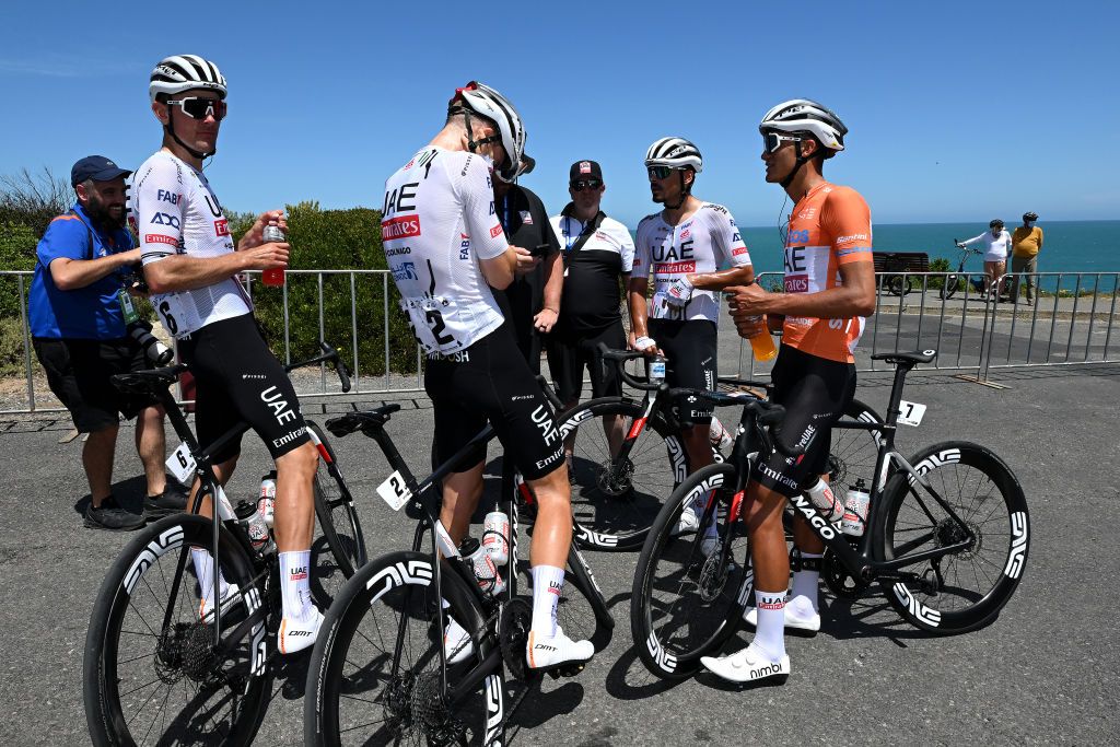 PORT ELLIOT AUSTRALIA JANUARY 19 LR Michael Vink of New Zealand Finn FisherBlack of New Zealand and Isaac Del Toro Romero of Mexico and UAE Team Emirates Orange Santos Leaders Jersey react after the 24th Santos Tour Down Under 2024 Stage 4 a 1362km stage from Murray Bridge to Port Elliot UCIWT on January 19 2024 in Port Elliot Australia Photo by Tim de WaeleGetty Images