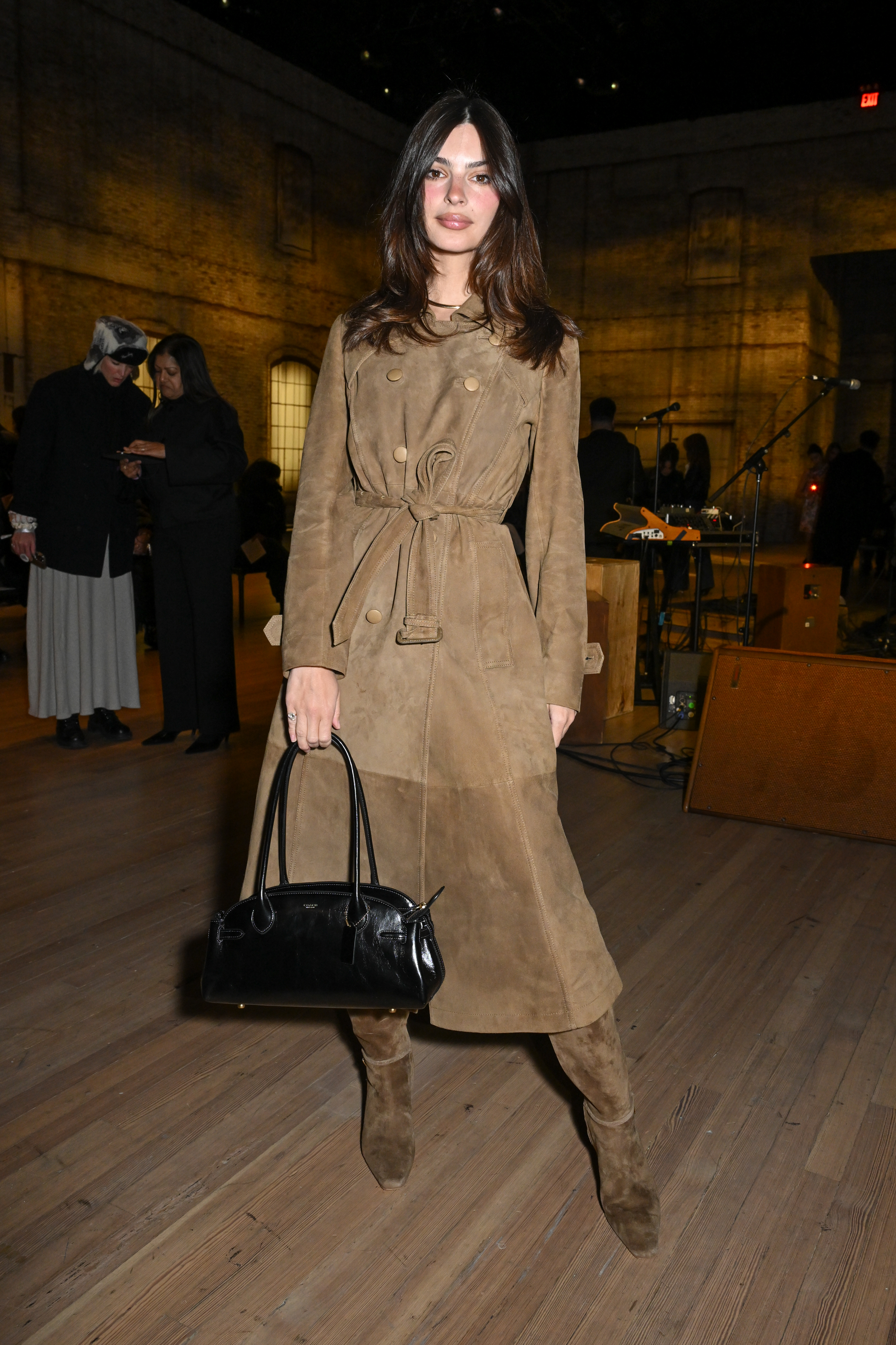Emily Ratajkowski attended the Coach Fall 2025 show with the Coach Empire Carryall in tow
