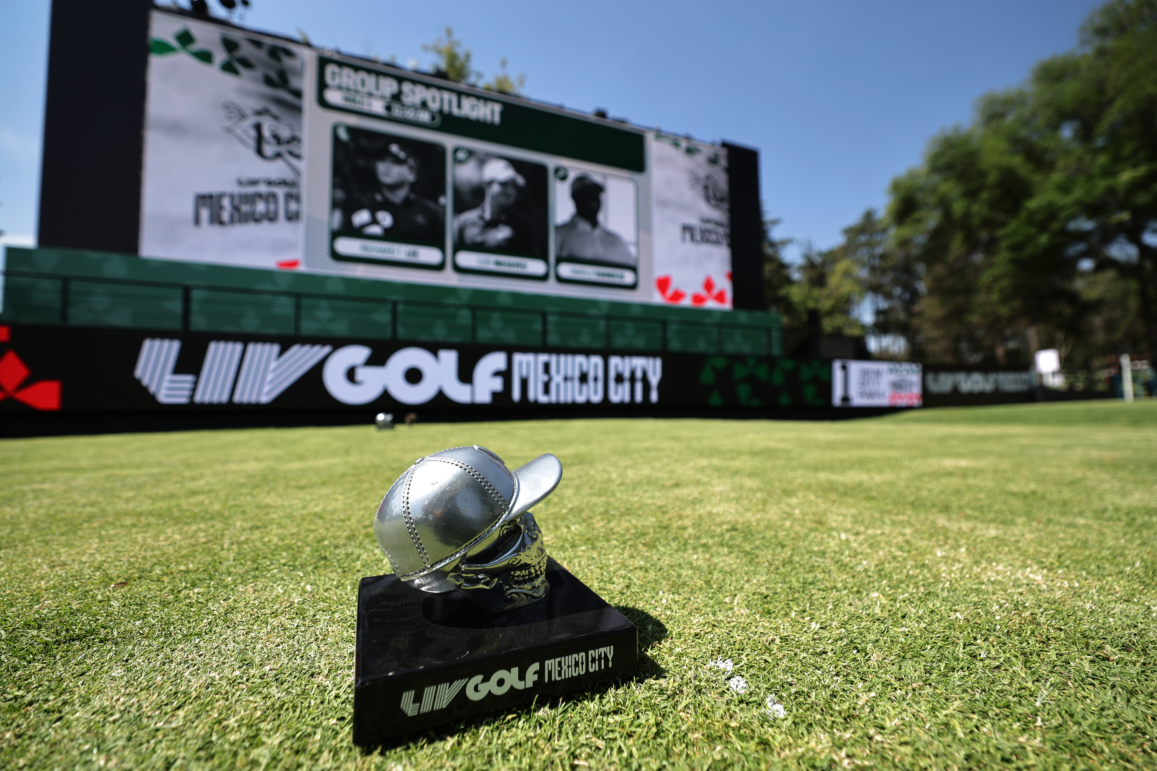 A general view of a LIV Golf Mexico City tee marker in the foreground and a LIV Golf Mexico City leaderboard in the background