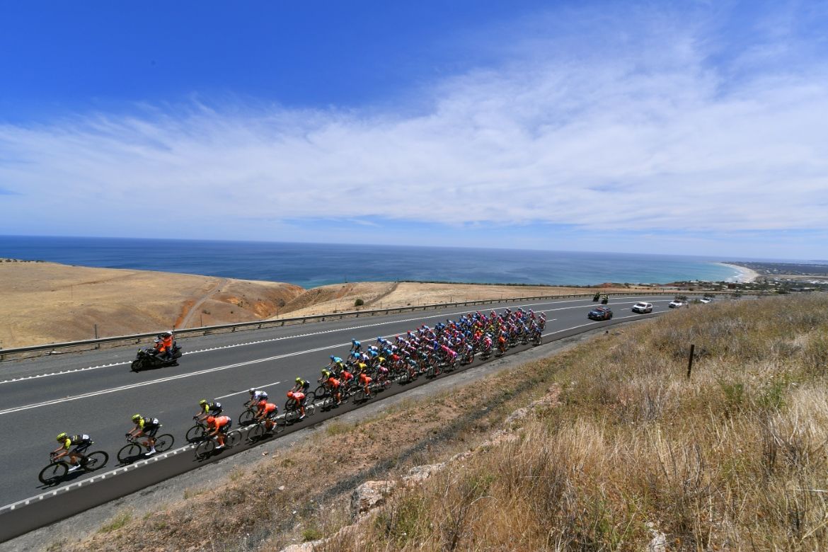 The peloton makes its way along