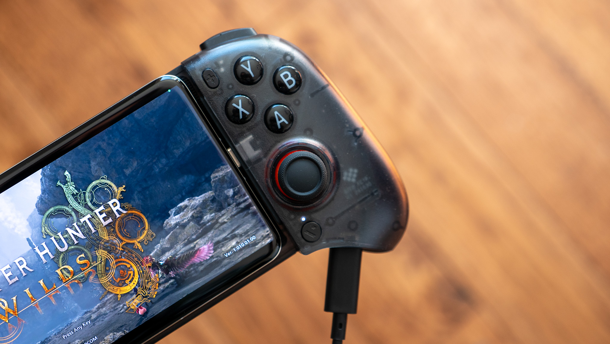 The face buttons on the Viture x 8BitDo Ultimate Mobile Controller with a pair of Viture Pro smart glasses plugged into the dedicated port on the controller