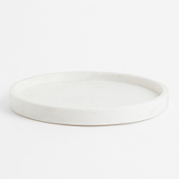 Round marble tray from H&amp;M, $29.75