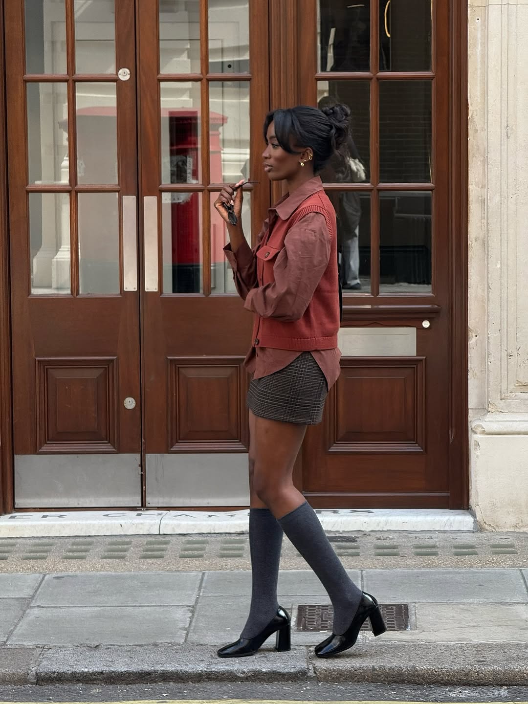 woman wearing knee high sock outfit