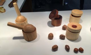 Different shades of wooden mortars and containers