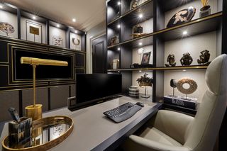 luxury home office with open shelving and desk and monitor lift