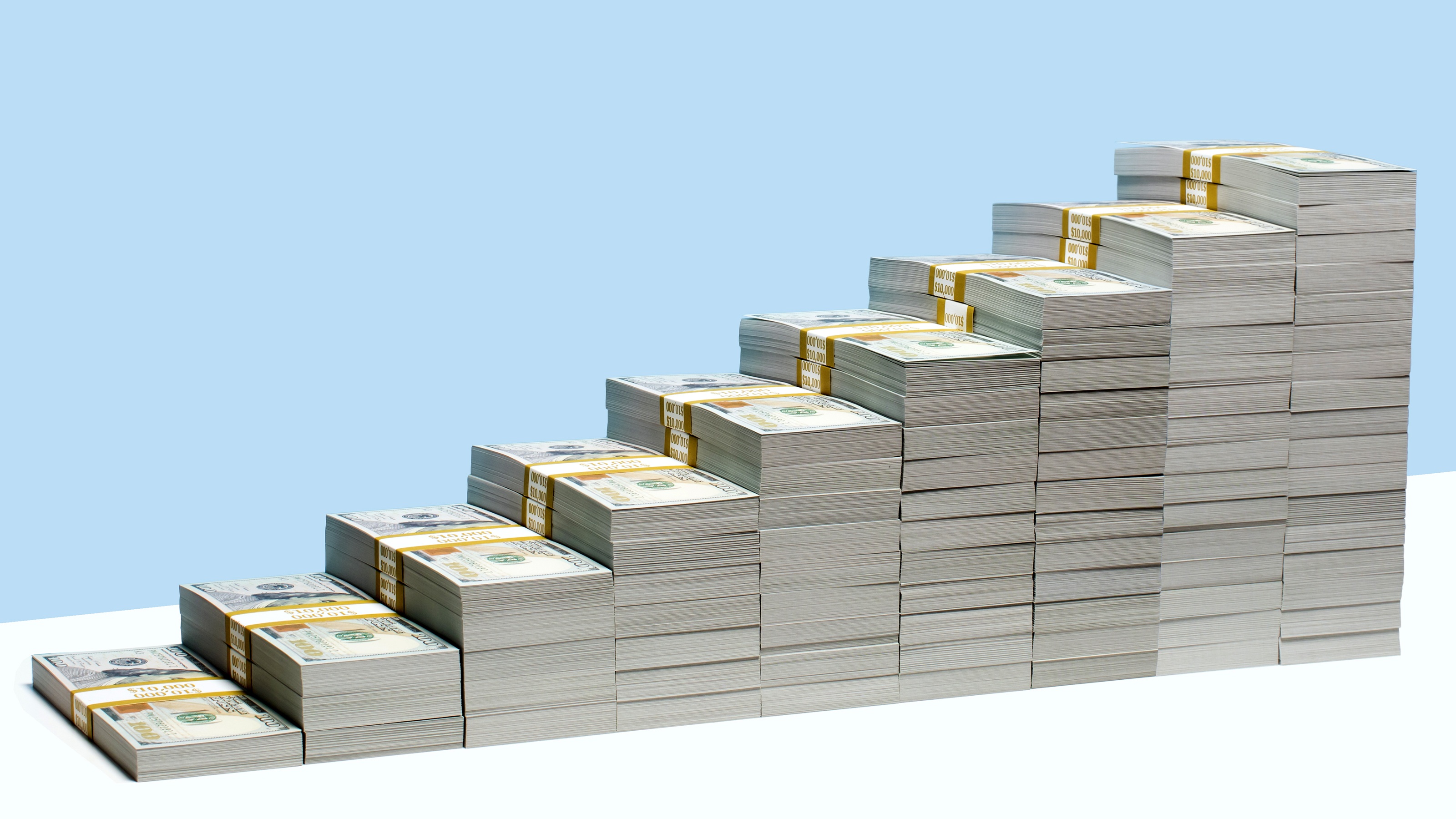 Several stacks of cash getting subsequently higher.