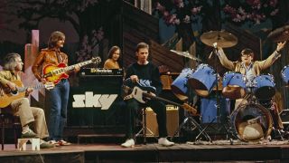 English/Australian instrumental group Sky perform on a television show at BBC Television Centre in London in 1980. Members of the group are, from left, guitarists John Williams and Kevin Peek, keyboard player Francis Monkman, bass guitarist Herbie Flowers and drummer Tristan Fry. (Photo by David Redfern/Redferns)