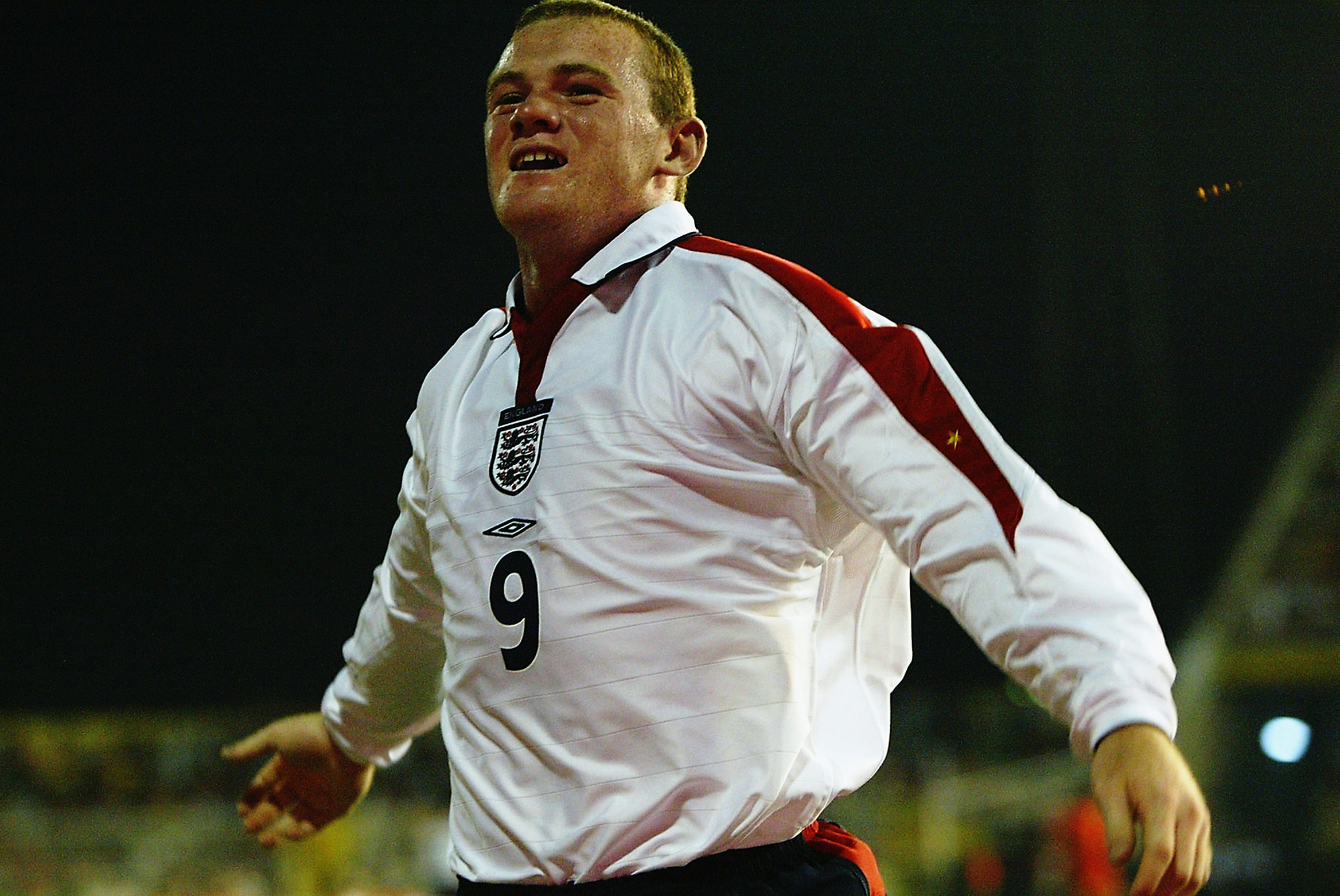 Wayne Rooney celebrates after becoming England's youngest ever goalscorer after netting against Macedonia in September 2003.