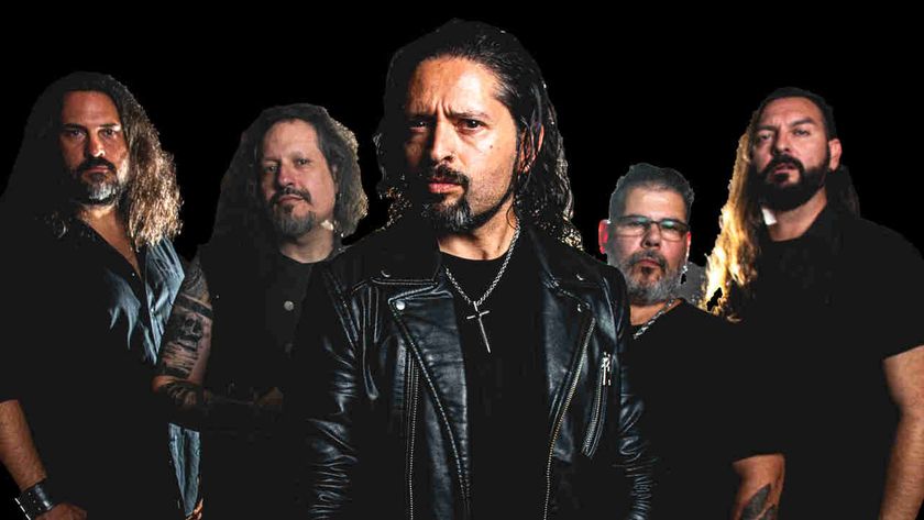 Ronnie Romero and his band posing for a photograph