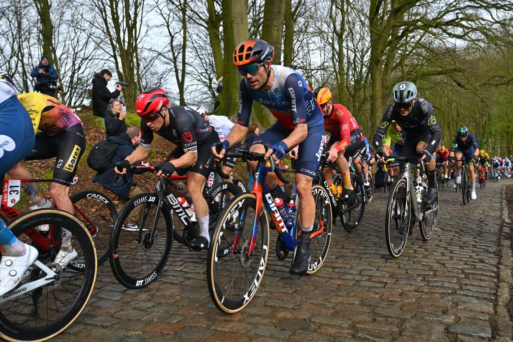 KOKSIJDE BELGIUM MARCH 15 LR Arvid De Kleijn of The Netherlands and Tudor Pro Cycling Team and Luka Mezgec of Slovenia and Team Jayco AlUla compete during the 22nd Bredene Koksijde Classic 2024 a 2012km one day race from Bredene to Koksijde on March 15 2024 in Koksijde Belgium Photo by Luc ClaessenGetty Images