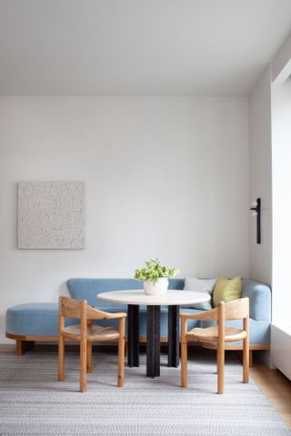 Dining room with chaise sofa as bench seating