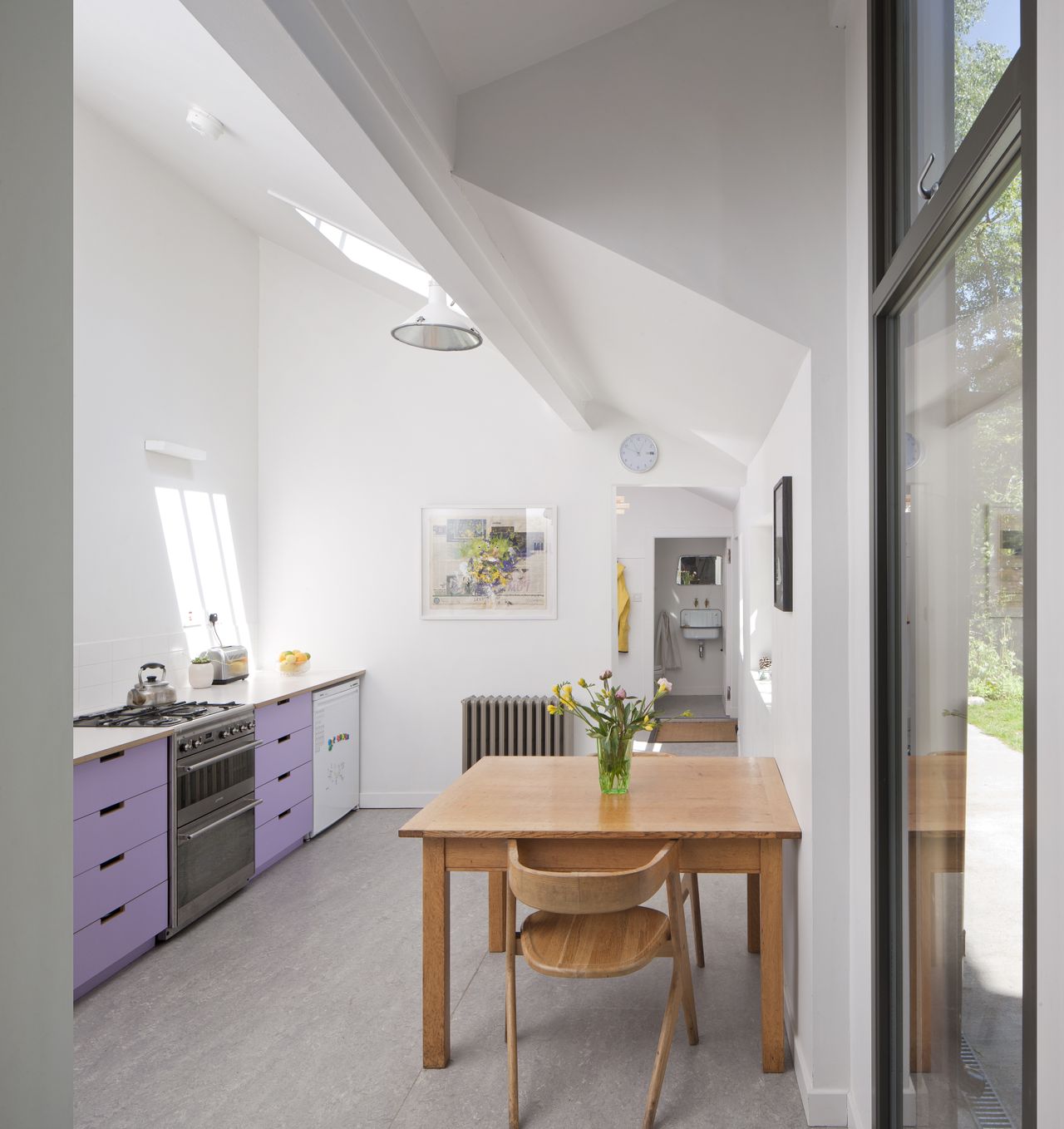 The kitchen carcasess are from Ikea, with bespoke birch ply fronts from Flux Laser Studio.