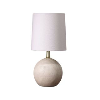 table lamp with round wooden base and fabric white cylindrical shade