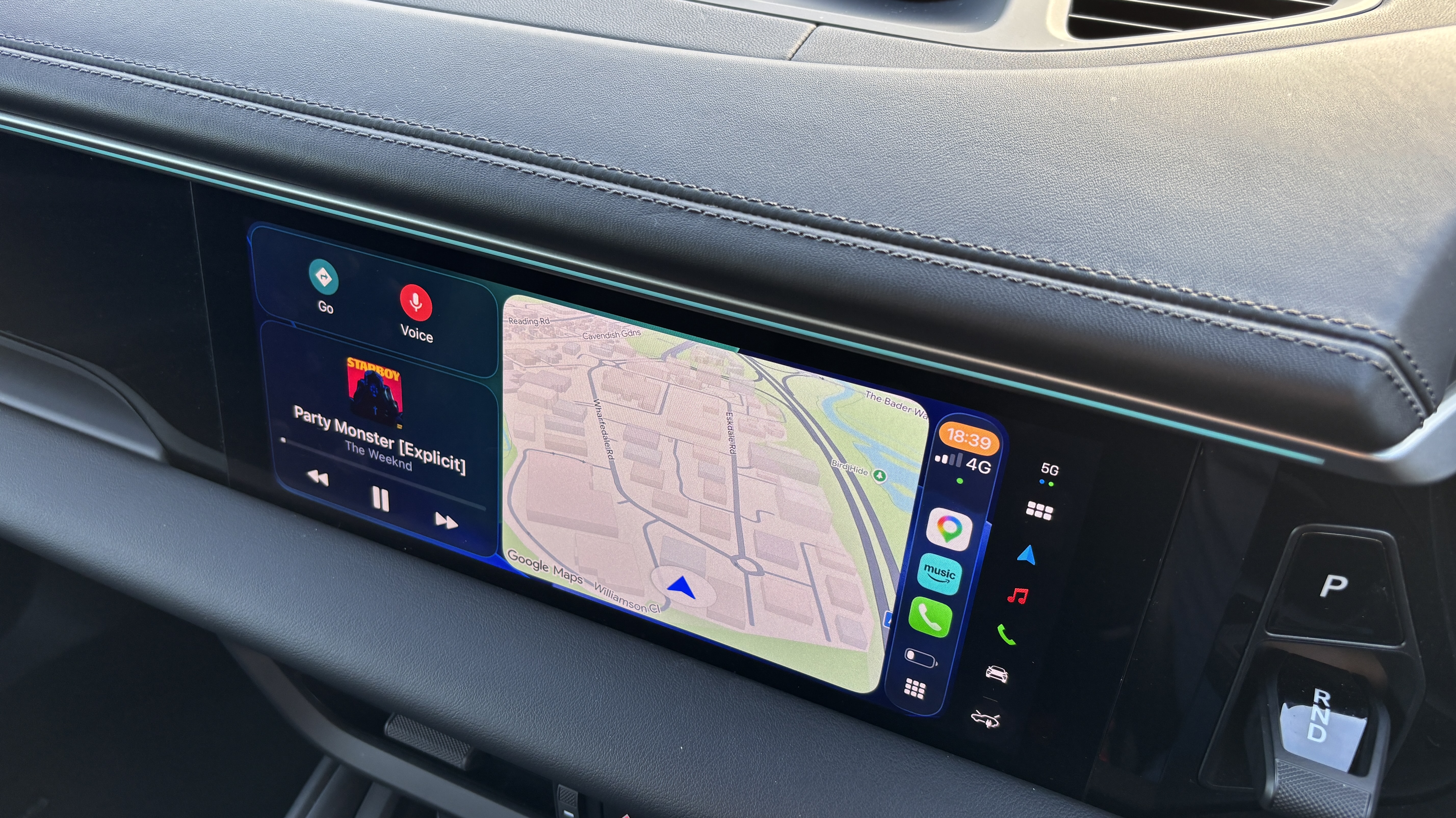 Porsche Macan on-screen display showing Apple CarPlay