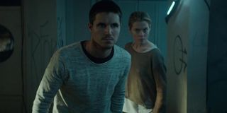 Robbie Amell and Rachael Taylor in ARQ