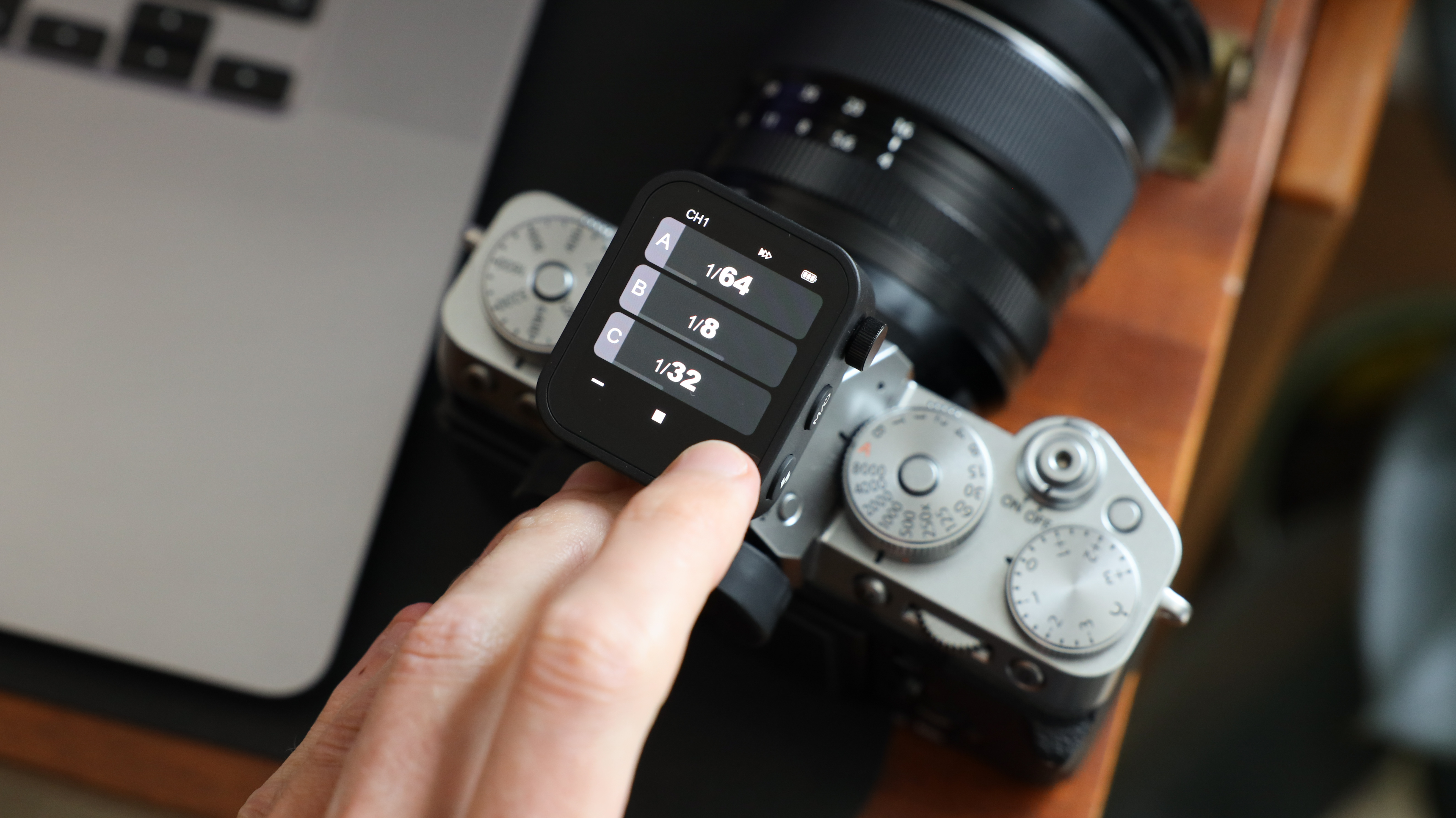 Godox X3 flash trigger mounted on a Fujifilm X-T5 camera