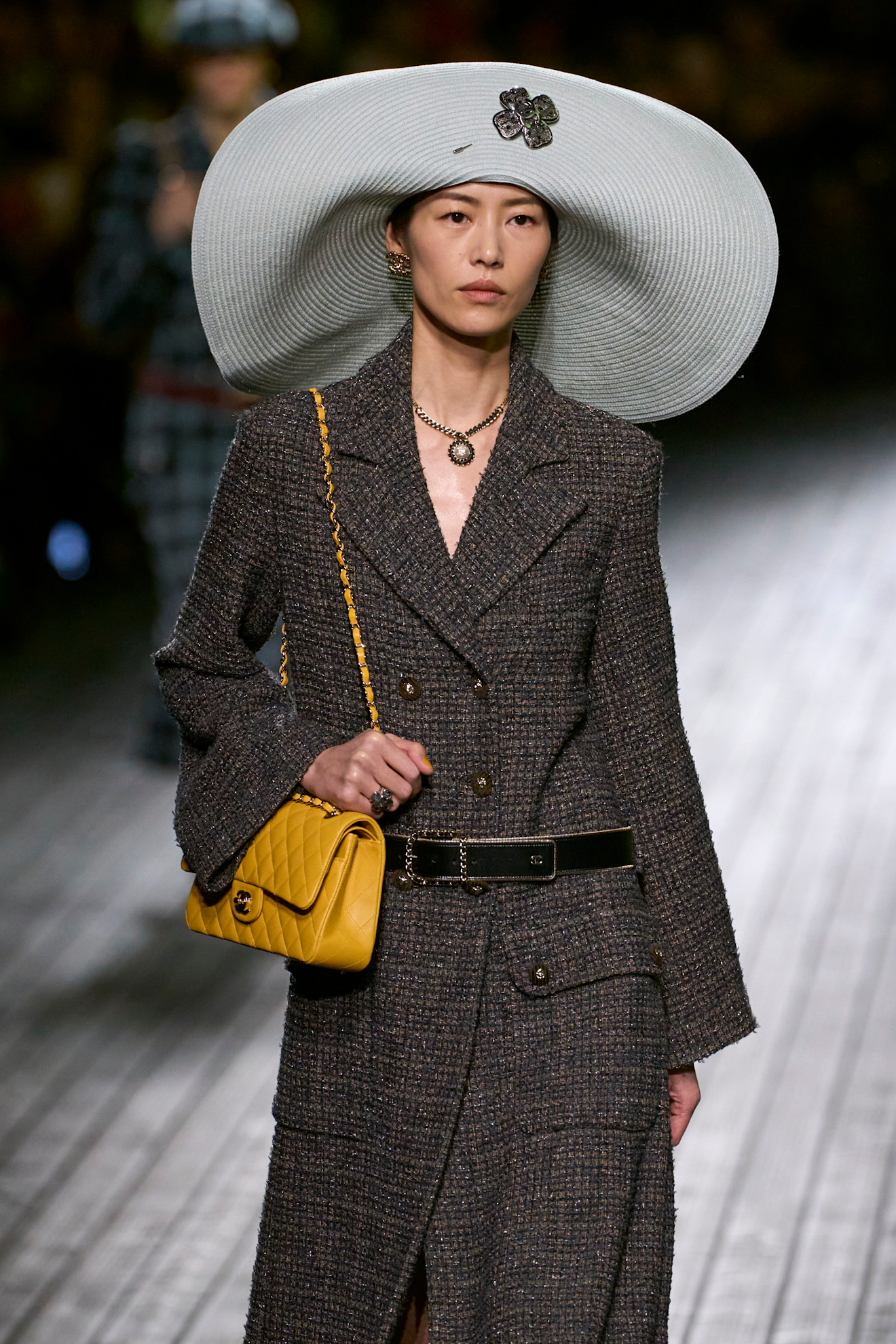 Chanel Fall 2024 model wearing sunhat