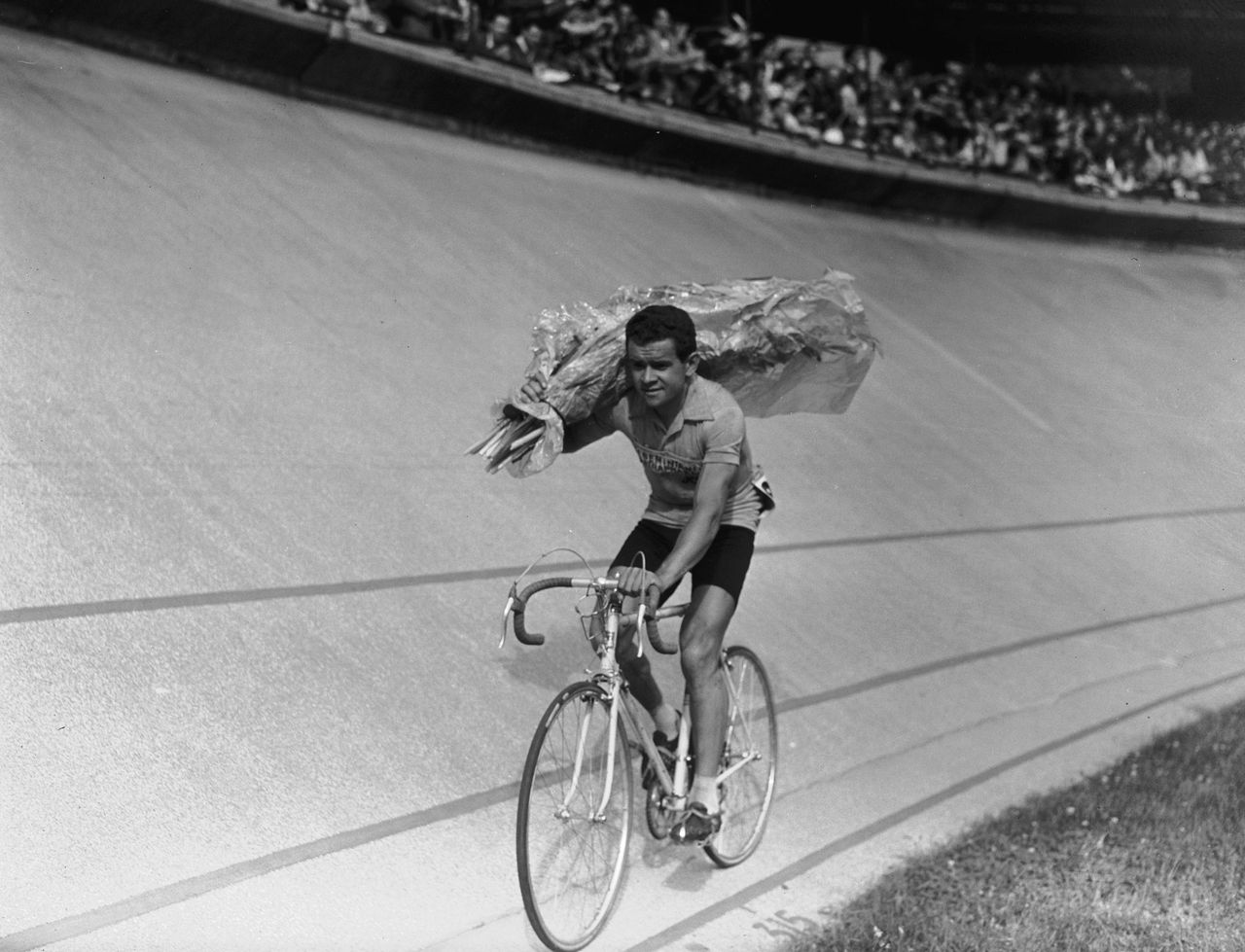 Roger Walkowiak celebrates his victory in the 1956 Tour de France