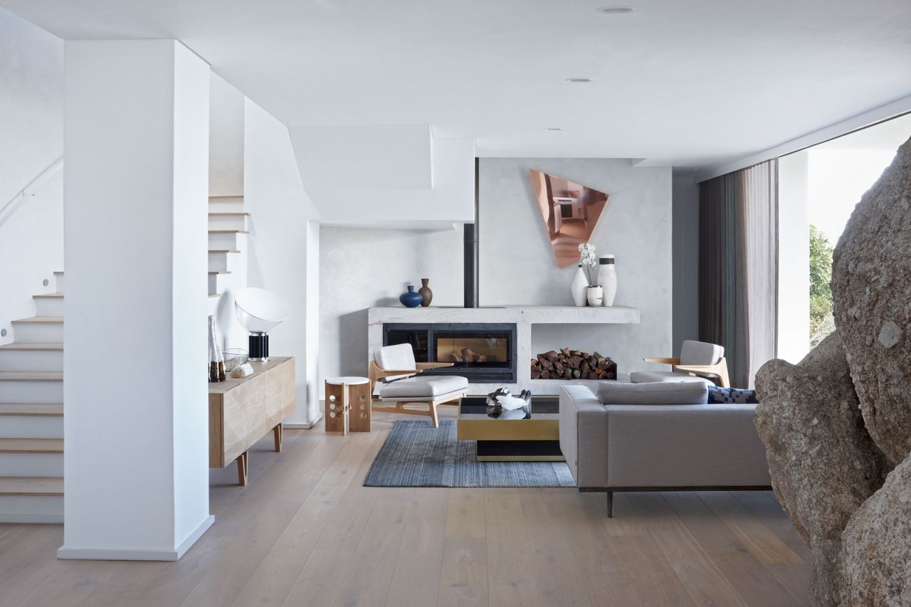 Lounge with staircase, white in colour