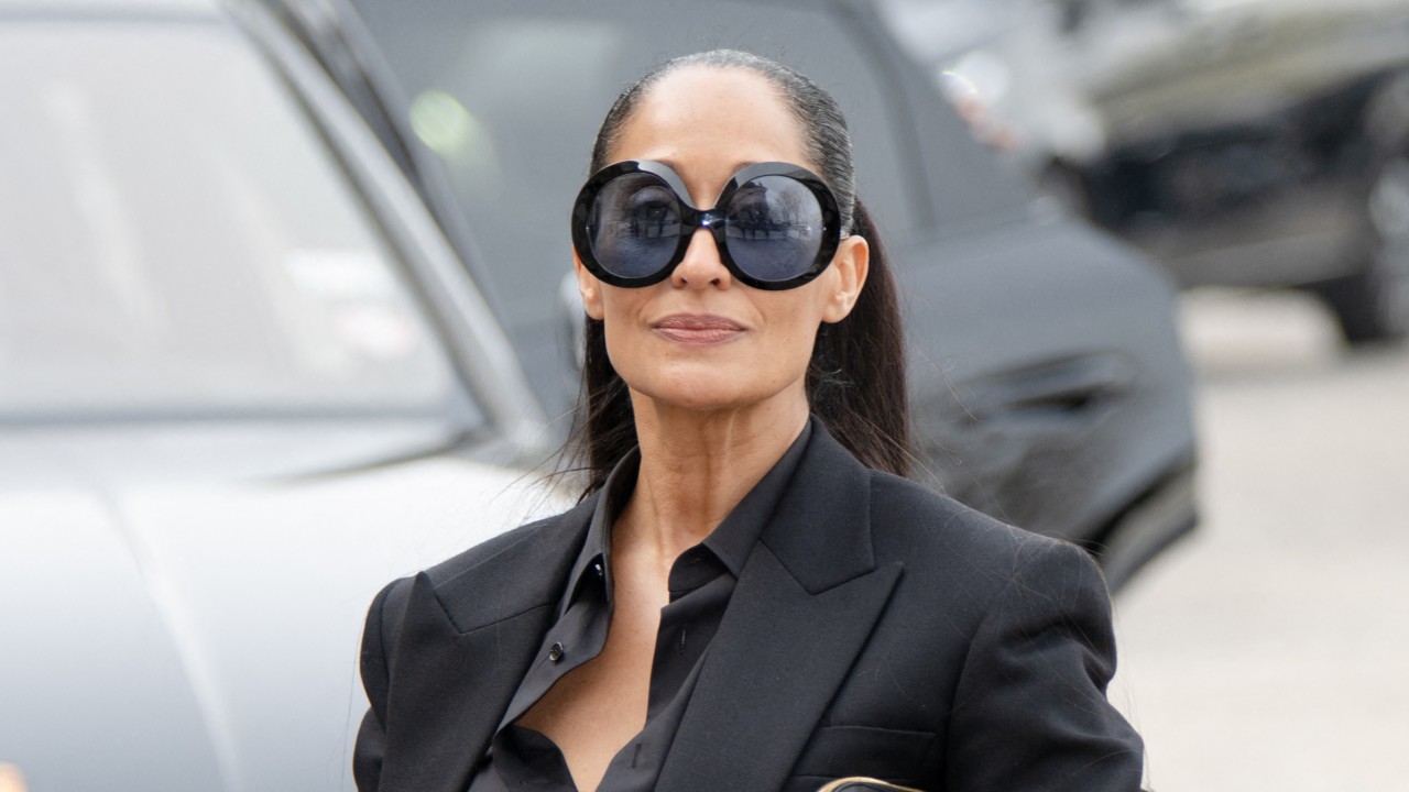 a black woman photographed during paris fashion week