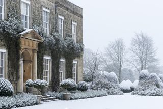 A home covered in snow