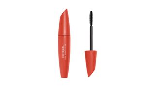 A salmon colored opened CoverGirl mascara tube for the best CoverGirl mascara.
