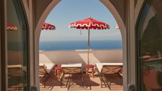 View out to sea from terrace at Il Capri Hotel, one of 10 colourful hotels to discover in 2024