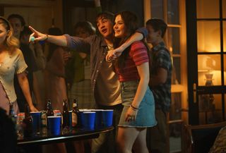 (L to R) Isaac Kragten as Liam, Chiara Aurelia as Young Ani playing beer pong at a party