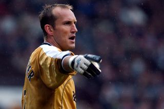 Goalkeeper Mark Schwarzer points while playing for Middlesbrough against Manchester United, 2004