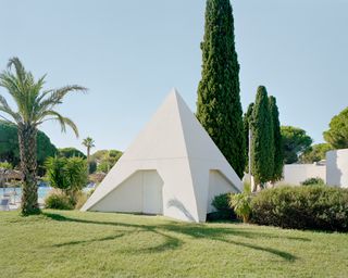 La Cité Oasis, a photographic series on La Grande Motte, shot by Charly Broyez & Laurent Kronental and showing sculptural, white and geometric modernist architecture in the south of france, surrounded by green spaces and in monumental scale