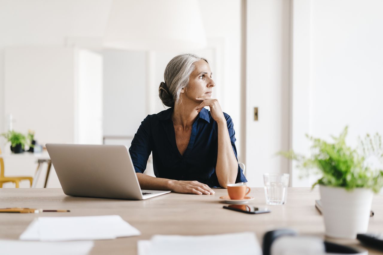 Woman thinking about her personal finances