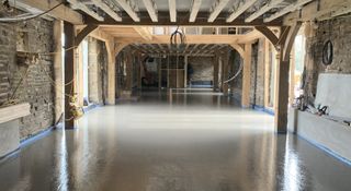 a floor screed laid over underfloor heating pipes