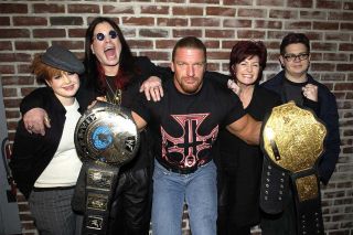 The Osbournes gave Sharon and her family – pictured here with WWE legend Triple H at an Ozzfest launch in 2002 – a whole new platform