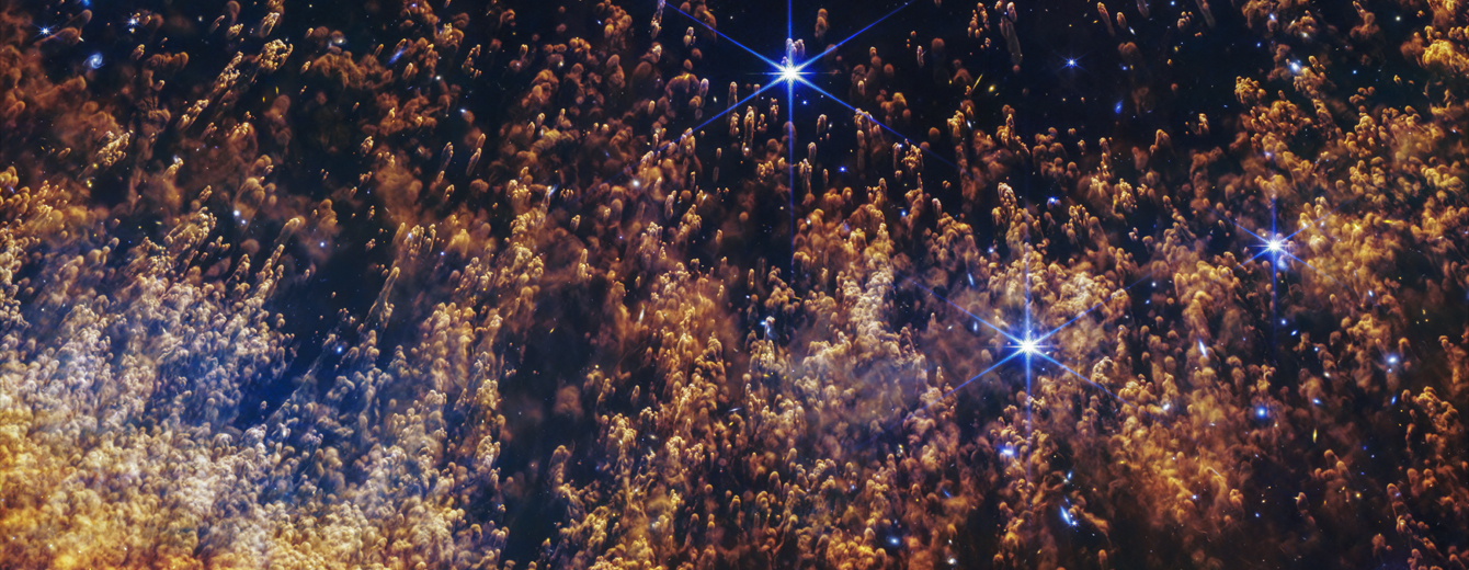 The Helix Nebula as seen by the JWST with its comet-like knots, fierce stellar winds, and layers of gas shed off by a dying star interacting with its surrounding environment.