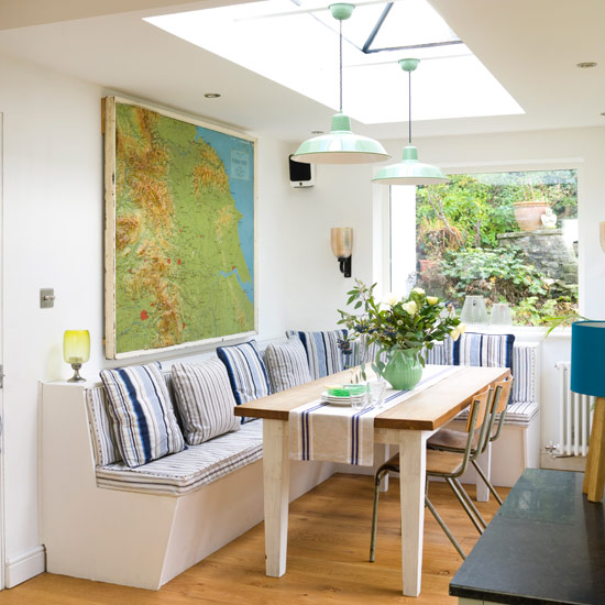 dining room with white wall and dining table