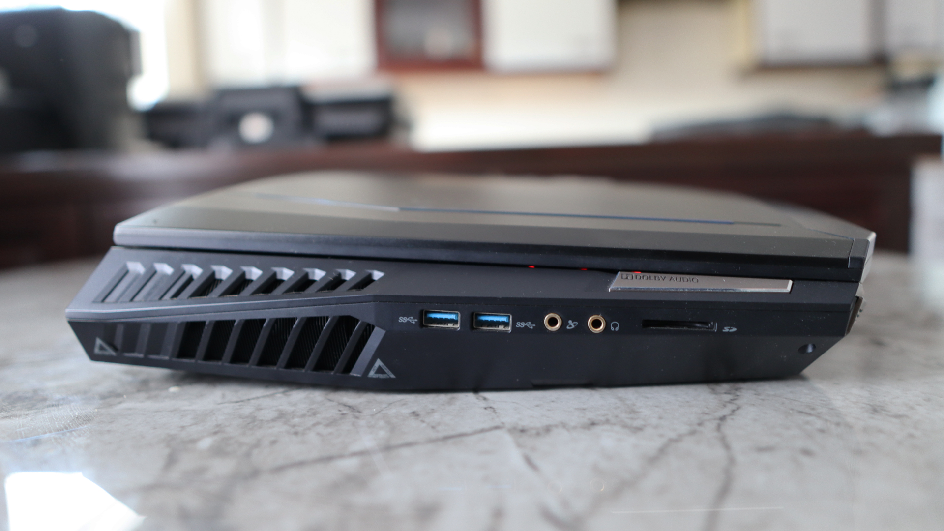 Acer Predator 21X gaming laptop on a marble table top