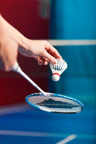 Badminton balls, called shuttlecocks, have feathered cones that increase air resistance, increasing their aerodynamic stability and causing them to fly more slowly than traditional balls.