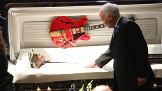 Family members of the late Chuck Berry file past his casket during a memorial service at the Pageant Theater in St. Louis on April 9, 2017. Berry died on March 18, 2017 at the age of 90.