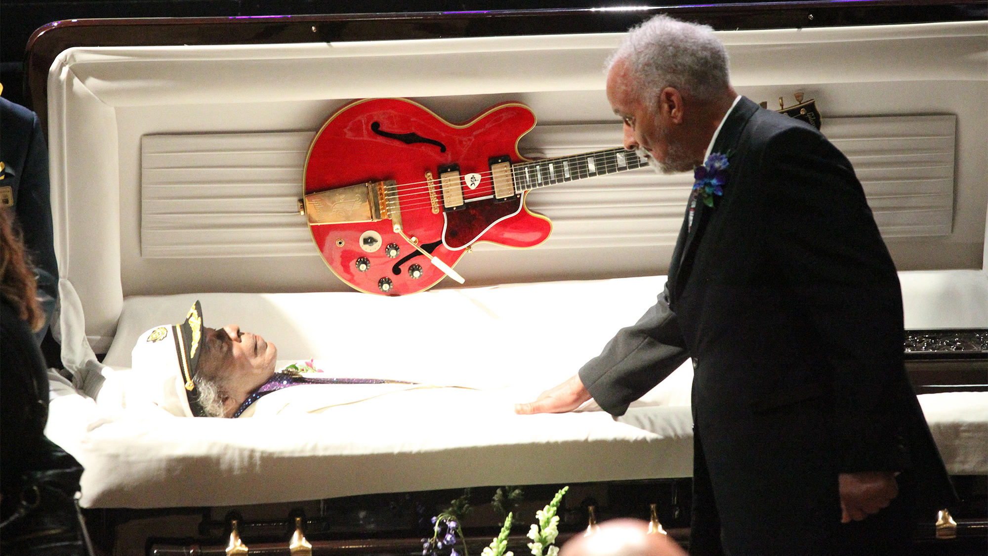 Family members of the late Chuck Berry file past his casket during a memorial service at the Pageant Theater in St. Louis on April 9, 2017. Berry died on March 18, 2017 at the age of 90. 